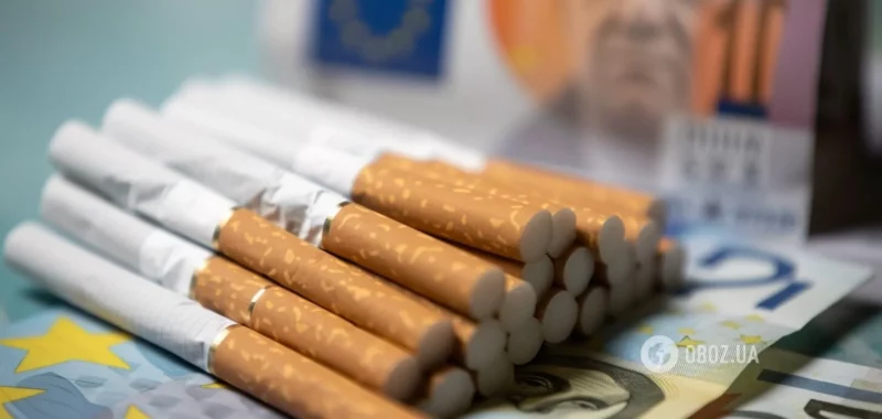 oboz-uaapackofcigarettesandtheeurointhebackground-ncd36dc45-10fc-4fc5-